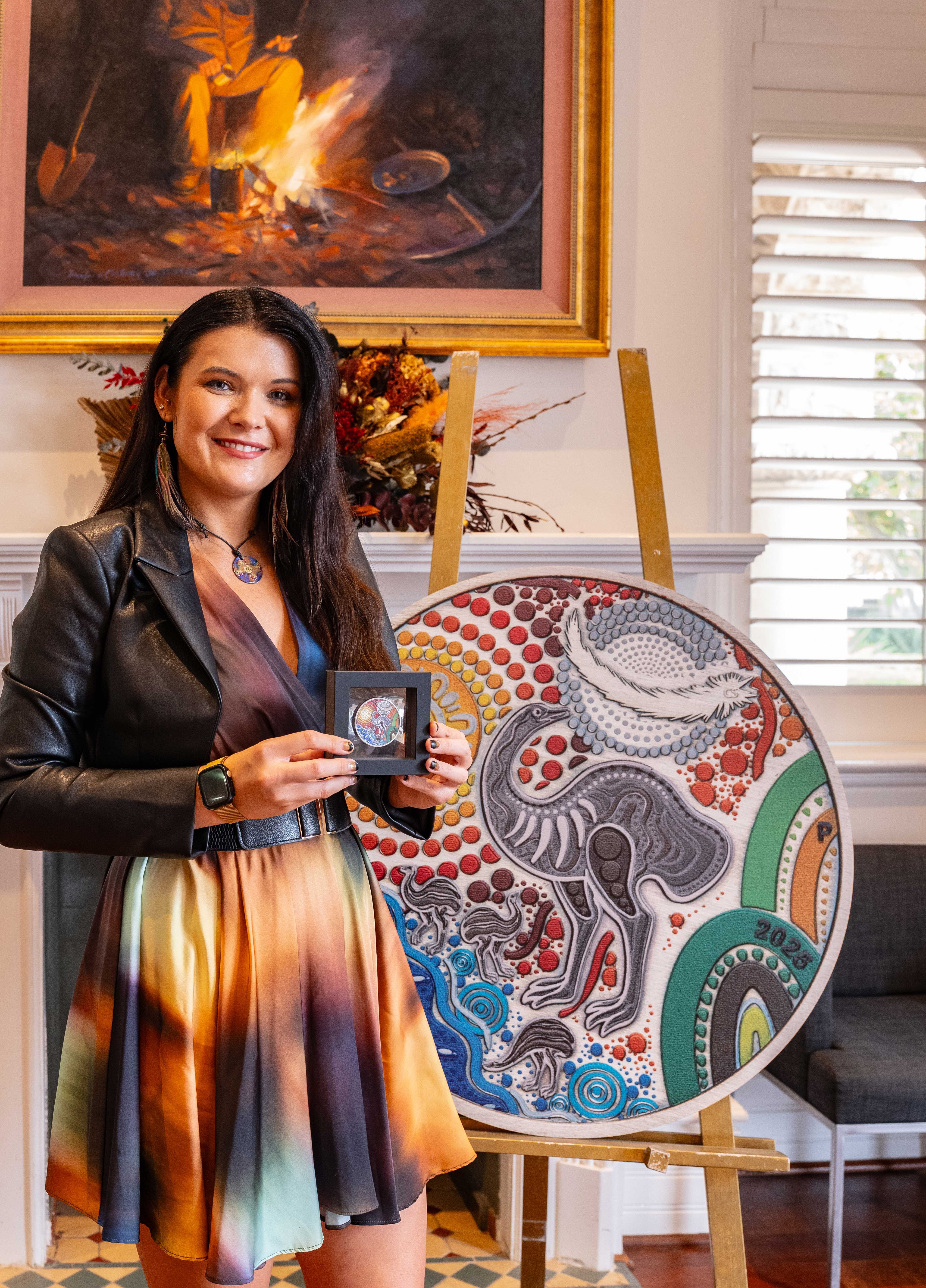 Indigenous artist, Chern'ee Sutton with her coin design